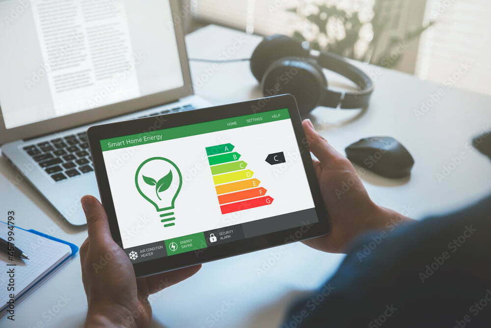 Image of a person using a tablet at a desk